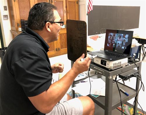 Teacher teaching remotely 