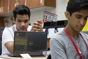 student with chromebook 